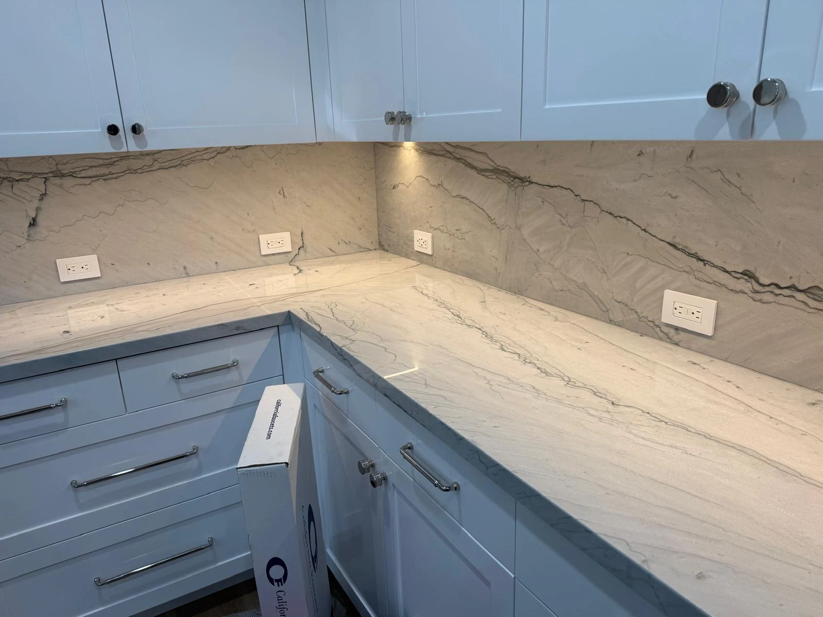 Finished electrical outlet and lighting work in a Los Angeles kitchen by JE Electric